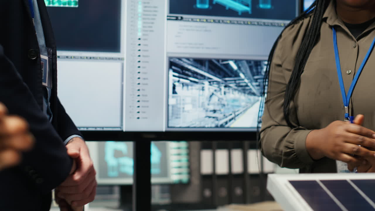 Investors Shaking Hands, Closing Deal After Reviewing Solar Technology Reports