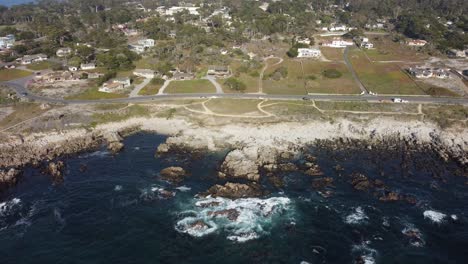 aerial zoom in asilomar beach in monterey ca