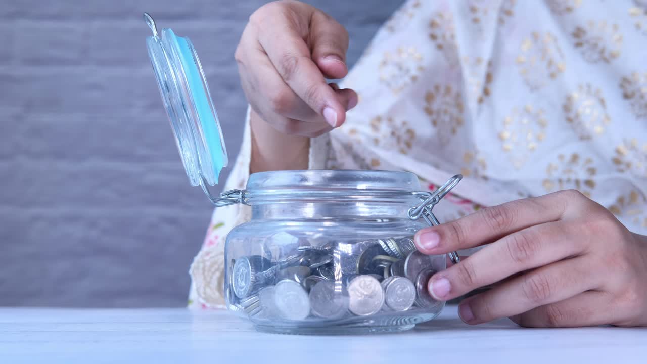 Saving Money in a Glass Jar