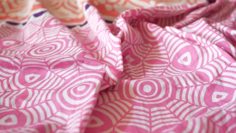 pink and white geometric fabric texture