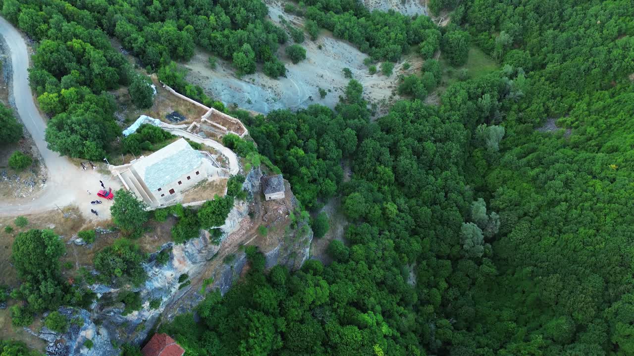 Saint Anna orthodox stone church North Greece Agia Anna Waterfall dried water cascade aerial drone