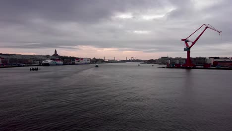 Aerial-view-of-harbor-in-Gothenburg,-Sweden-from-drone-on-a-cloudy-and-grey-day