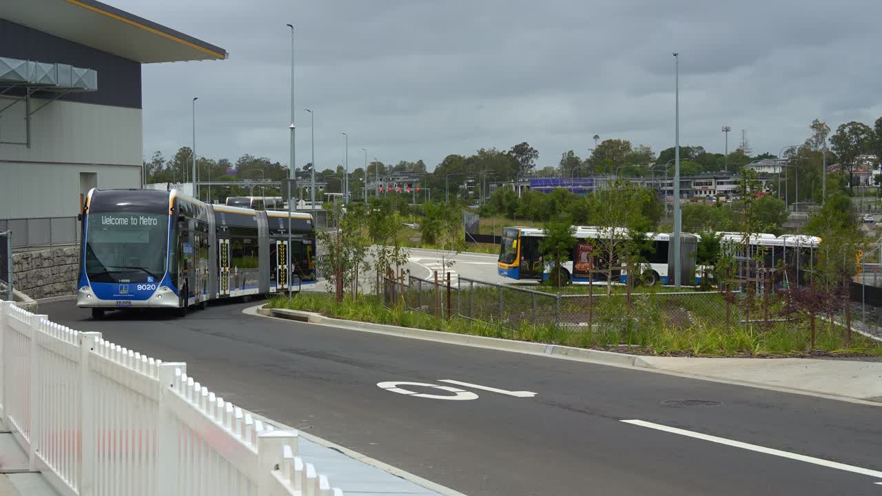 Turn-up-and-go Brisbane Metro bus driving around Rochedale depot, an innovative bus rapid transit system in Queensland.