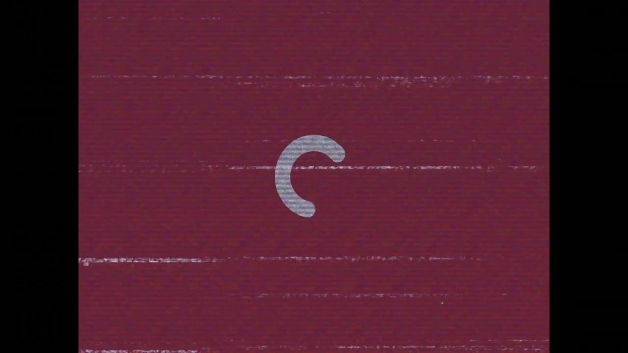 Schermo bordeaux con effetto glitch che avvia un'icona a rotazione che pulsa per indicare il caricamento.