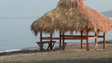 Handheld-shot-of-hut-in-the-seashore