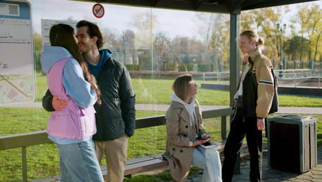 young people at bus stop