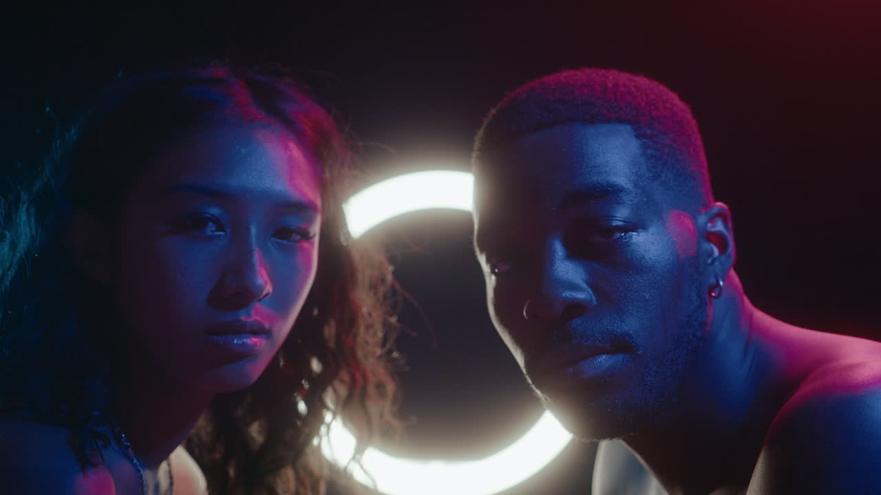 Young Beautiful Couple in Neon Lights