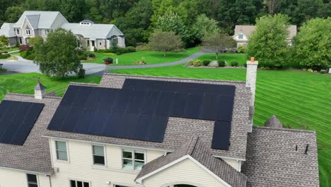 solar panels on house rooftop with shingles
