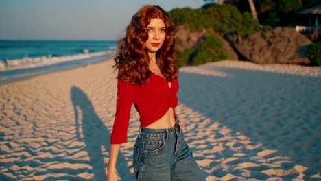 beautiful woman on a beach at sunset