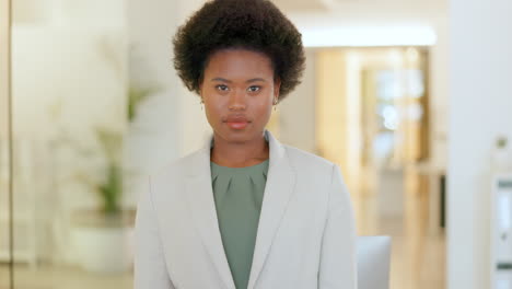 portrait of lawyer with afro standing with arms