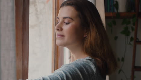 beautiful-young-woman-opening-curtains-looking-out-window-stretching-enjoying-fresh-new-day-feeling-rested