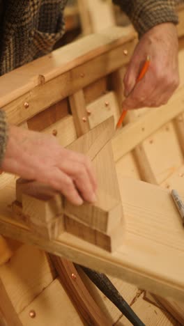 boatbuilder tracing oak knee traditional wood boat construction