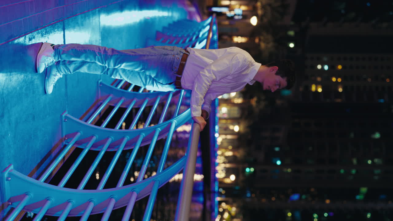 Man on Bridge at Night