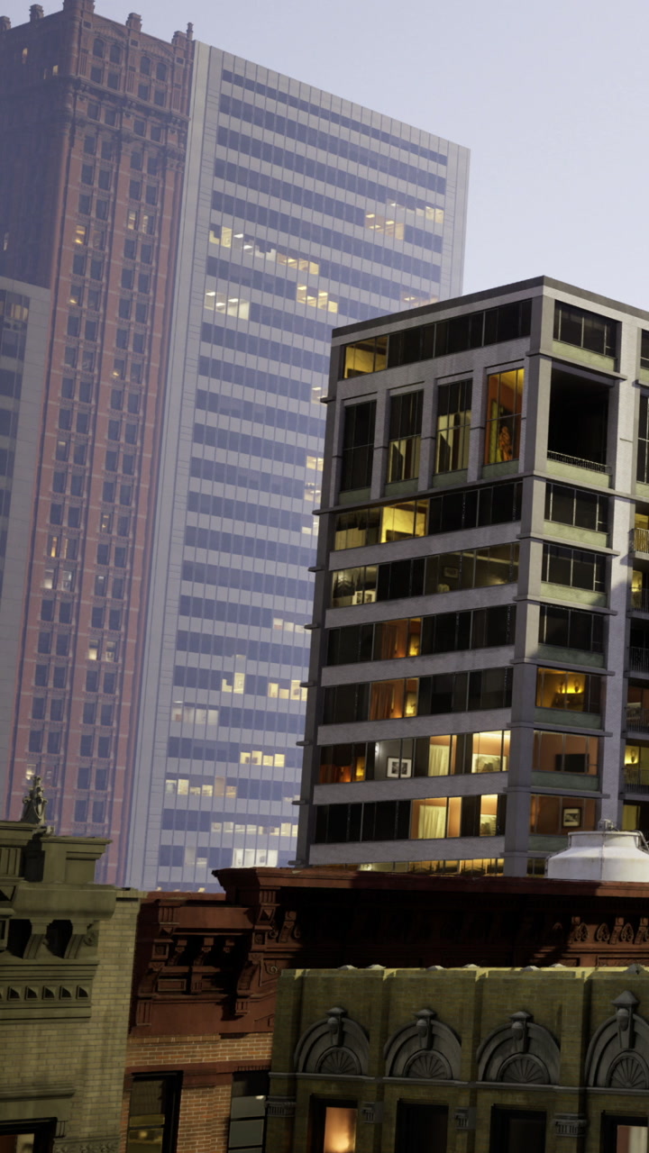 City buildings at dusk with lights on in apartments and offices