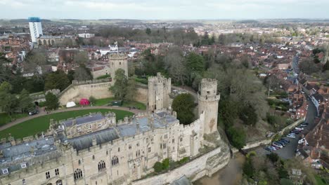 Towers-and-walls-of-Warwick-Castle-England-Drone,-Aerial,-view-from-air,-birds-eye-view