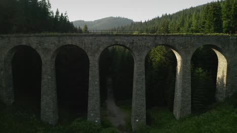 flying backwards from a forest under the chmarocsky viaduct in slovakia