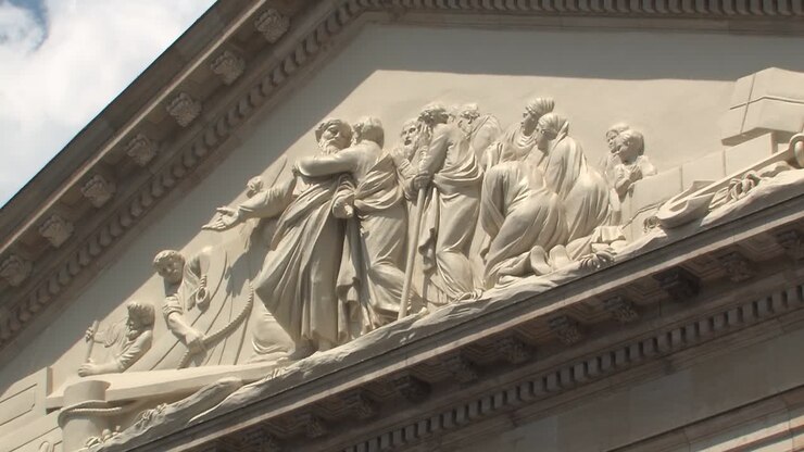 Medium shot of facade of French Cathedral of Friedrichstadt at Gendarmenmarkt, Französischer Dom, Berlin, Germany-1