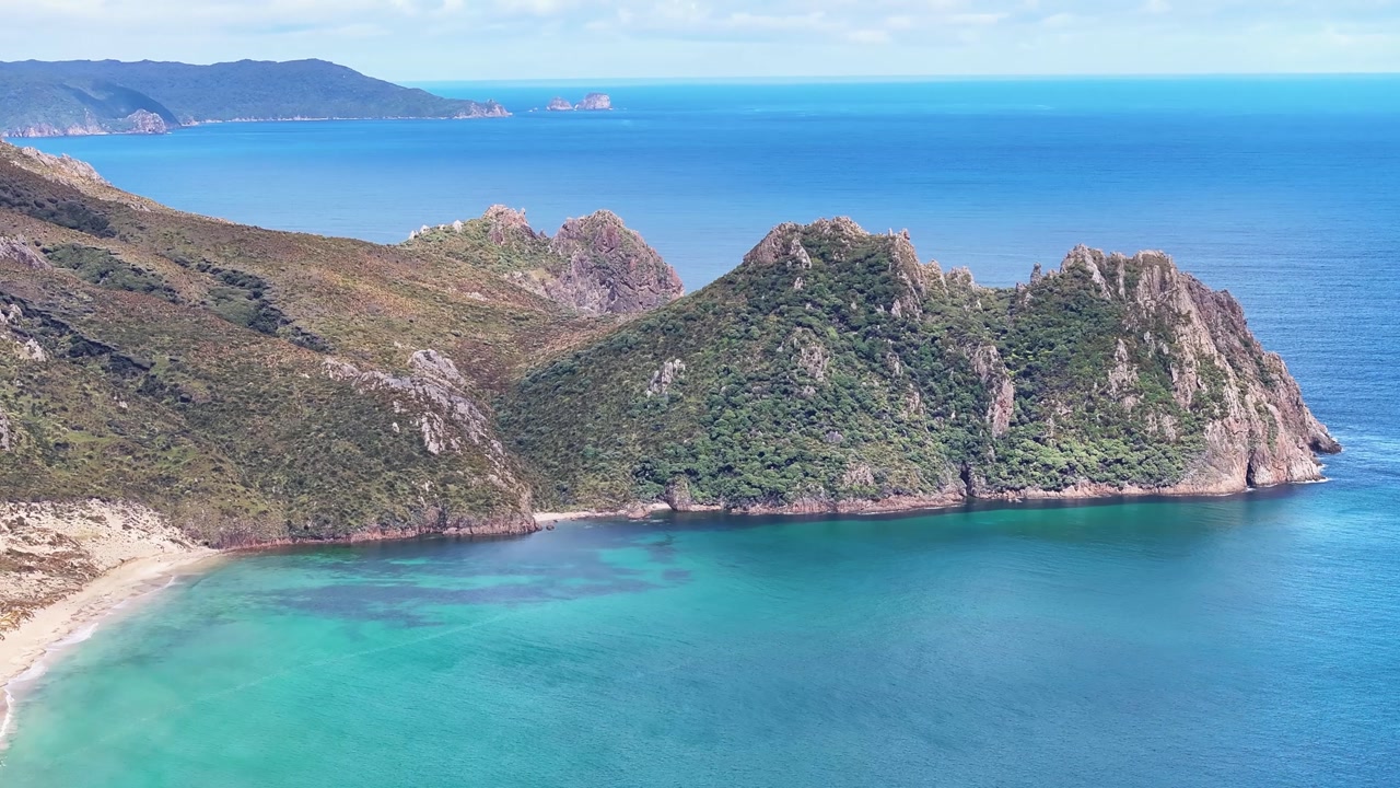 Aerial of West Coast of Stewart Island, Rakiura National Park, New Zealand. Remote head and beach.