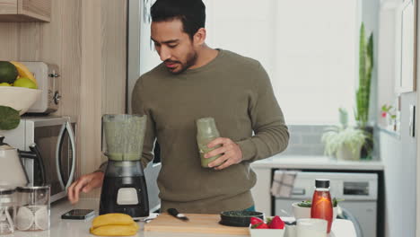 Phone,-smoothie-and-health-with-a-man-drinking