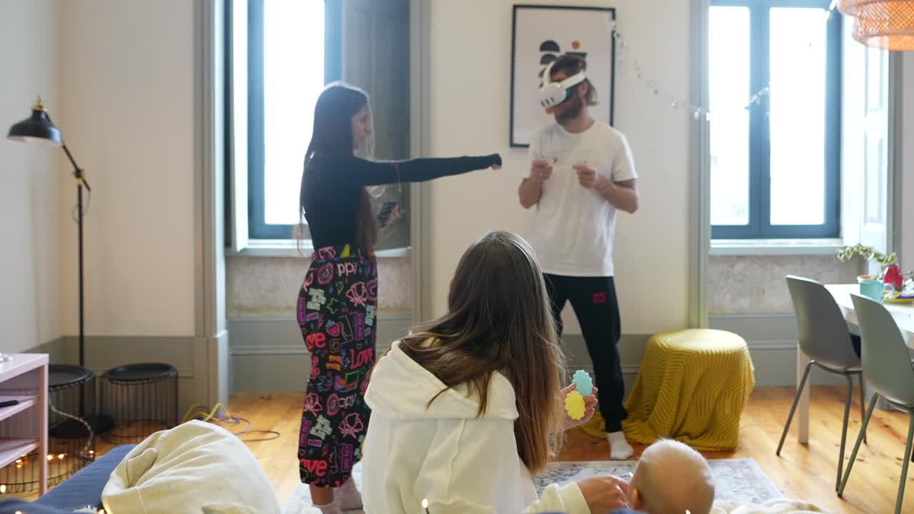 친구들이 집에서 vr 게임을 하고 있습니다.