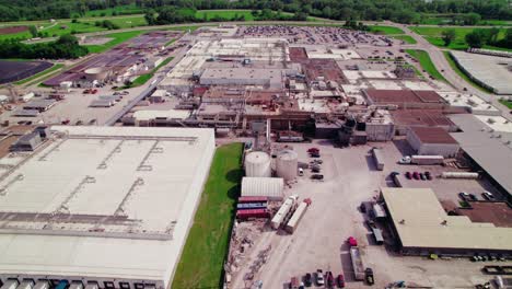 aerial view of cold storage facility in iowa with semi-trucks delivering refrigerated cargo.