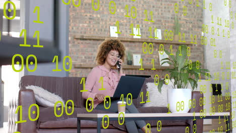 binary data processing over happy biracial casual businessman having phone call in office