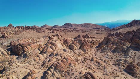 alabama hills in lone pine california 4k drone footage push up shot over rock features and the eastern sierra