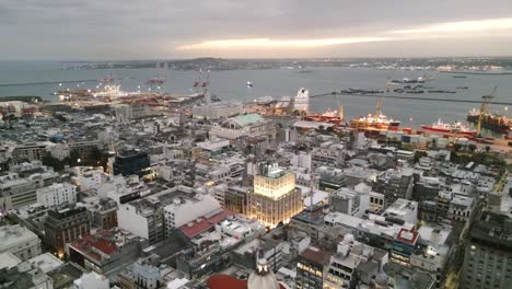 Montevideo-Uruguay-aerial-of-port-dock-with-cargo-boat-ship-cruise-during-night-illuminated-with-artificial-light