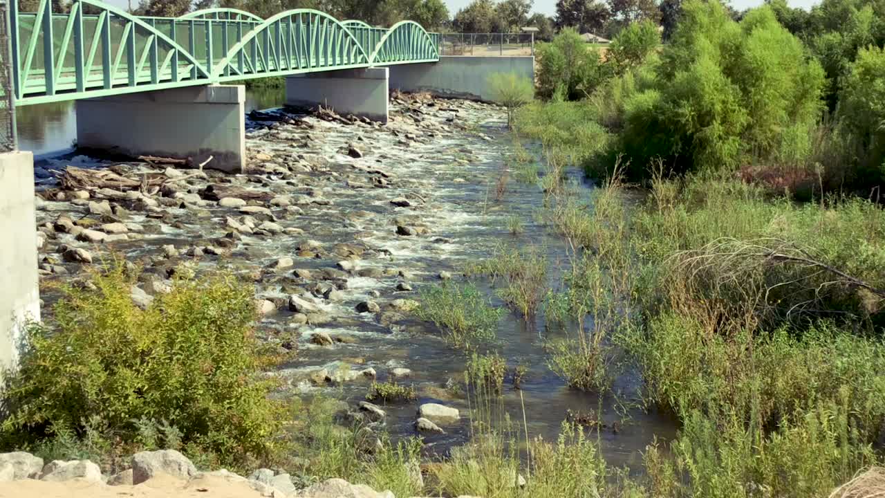 Bakersfield River Walk Park on a sunny summer day.