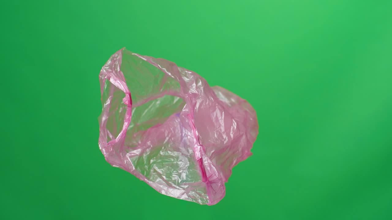 Red Plastic Bag On Green Screen Background