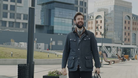 happy businessman celebrating success outdoors