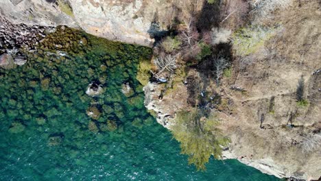 Aerial-view-of-high-the-Tettegouche-State-Park-and-the-waves-break-in-cliff