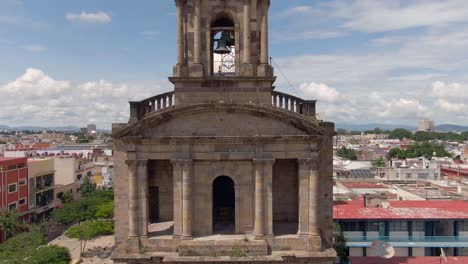 bell tower and facade of temple san jose de gracia in guadalajara, mexico