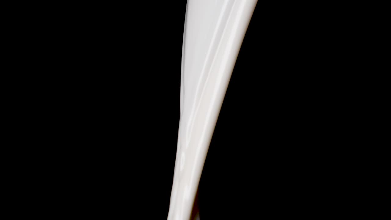 verter leche de avena vegana fresca frente al fondo negro