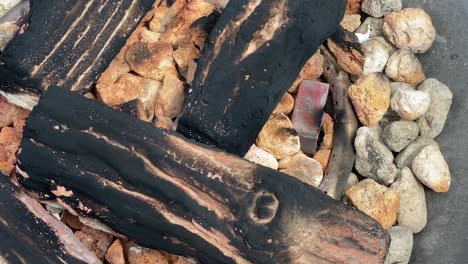 burning fire, firewood coal closeup in the fireplace at rooftop