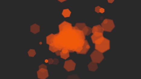 Abstract-art-vibrant-orange-dots-scatter-across-mysterious-black-background