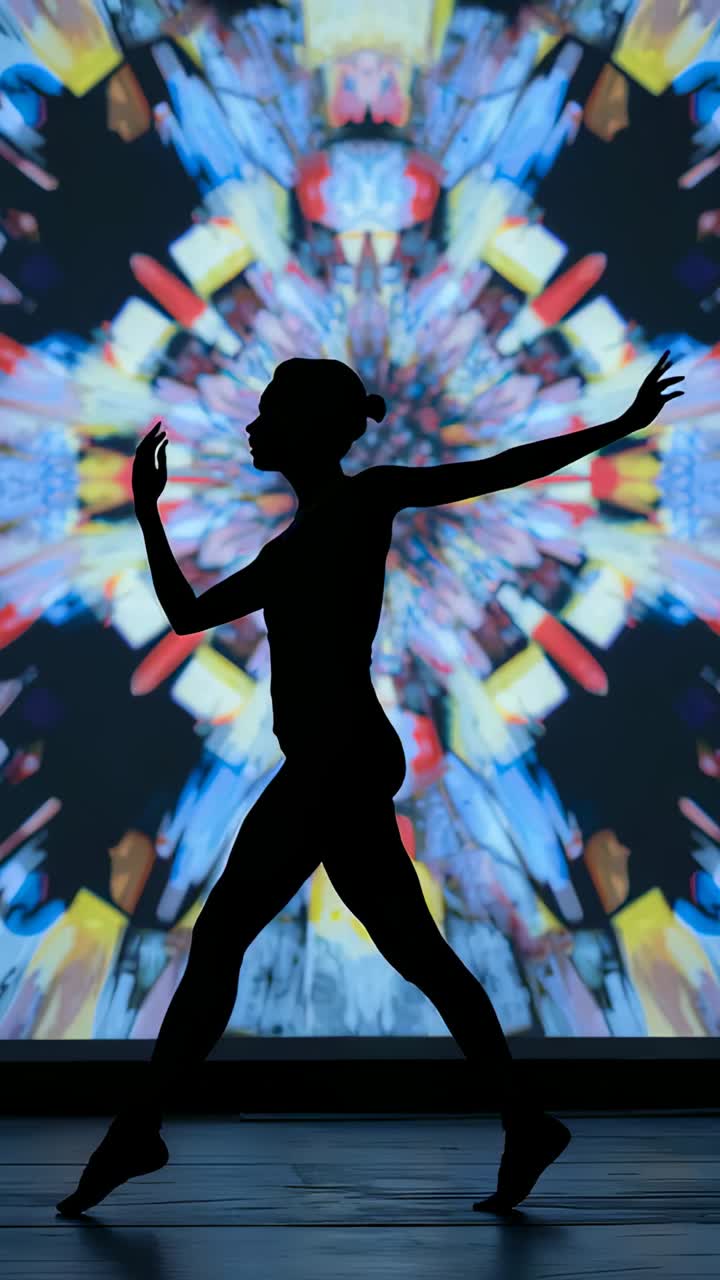 Vertical video: Striding dancer in bun in unitard moving across stage, extending arm before mandala