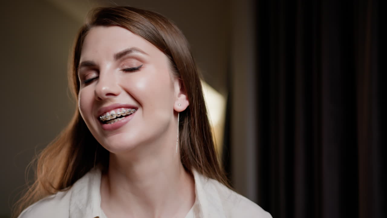 Woman with Braces Smiling Portrait