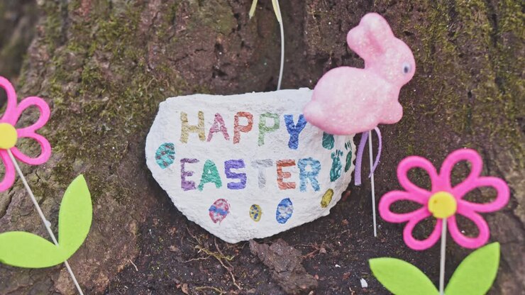 Kids made diy happy easter wish board in the garden