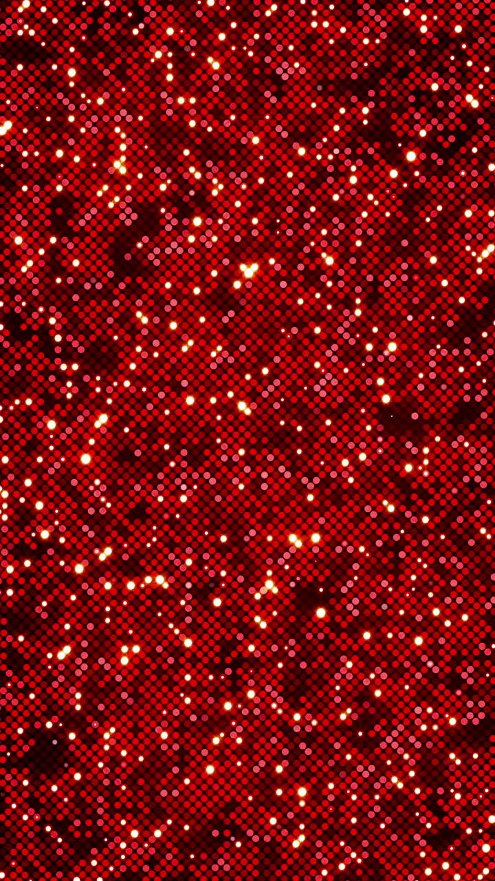 Sparkling Red Glitter Dots Background with Shimmering Lights