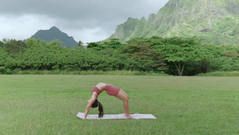 fitness model doing yoga, back bend