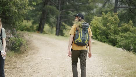 Two-travelers-say-hello-and-greeting-in-forest