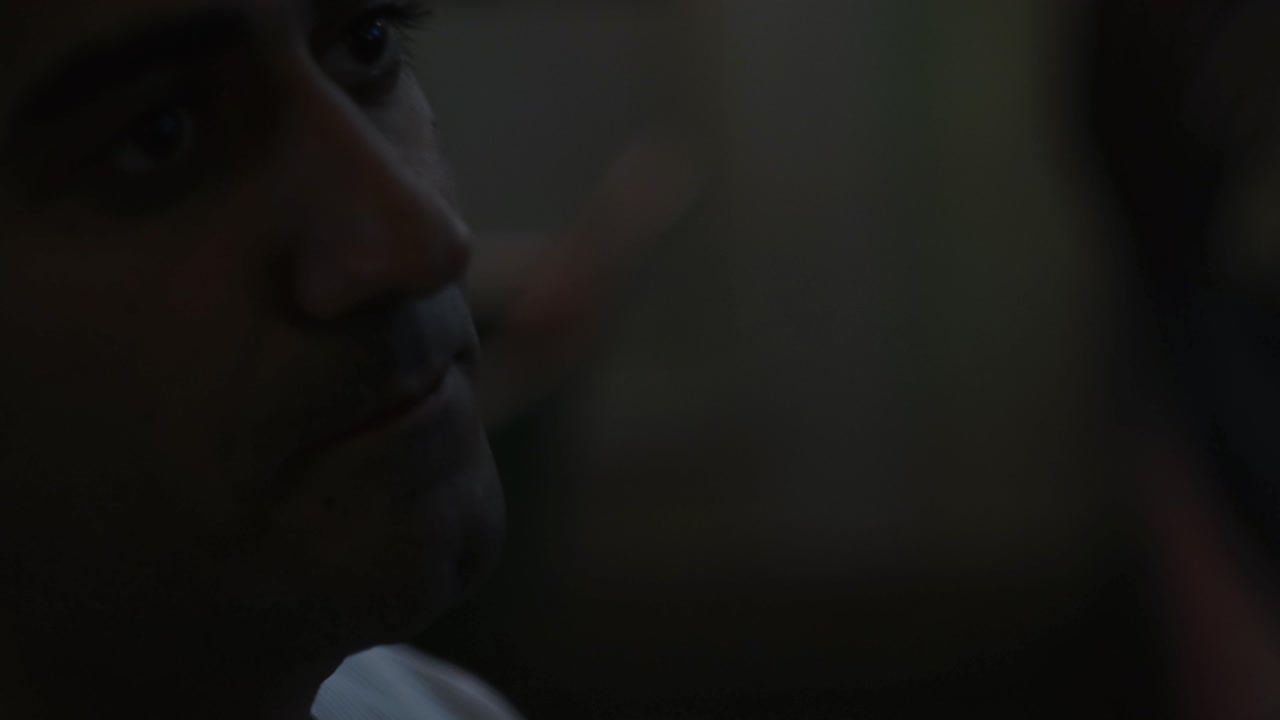 Man Drinking Coffee at Night