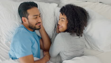 Love,-wake-up-and-hug-with-couple-in-bed-together