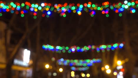 Colorful Christmas and new year lights on the street.
