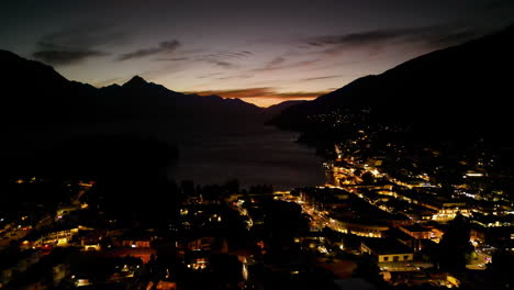 scenic view of downtown queenstown, new zealand at dusk, aerial panorama