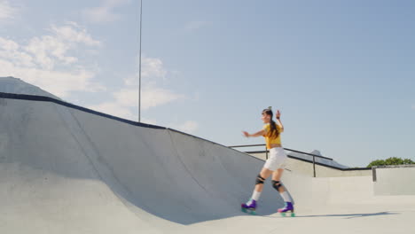 full length of two friends rollerskating in skate