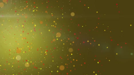 Autumn-Colored-Particles-Floating-Against-Blurry-Glowing-Background