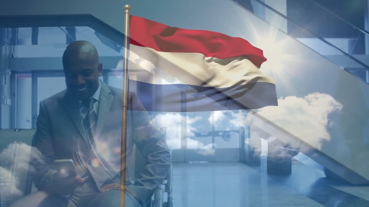 Using smartphone, businessman with Netherlands flag and clouds animation in office