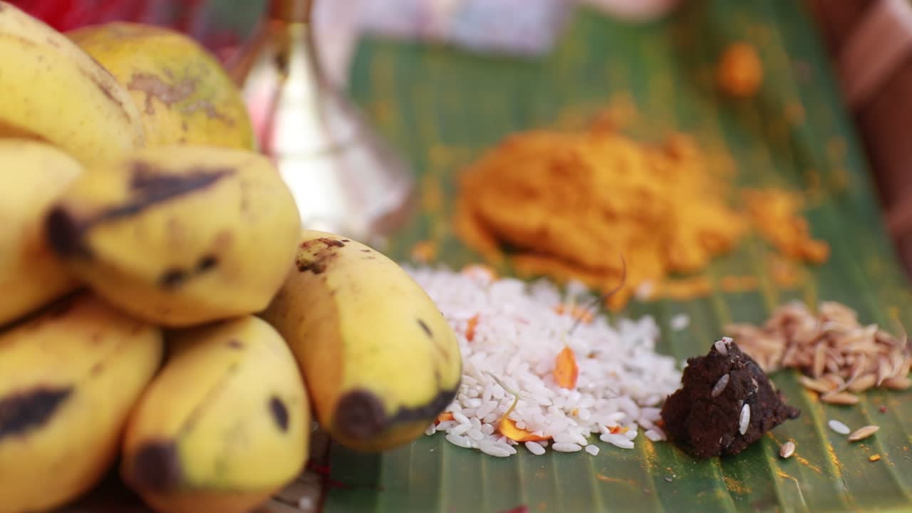 Close-up shot of fruits and rituals done during haldi, an Indian wedding in Kolkata